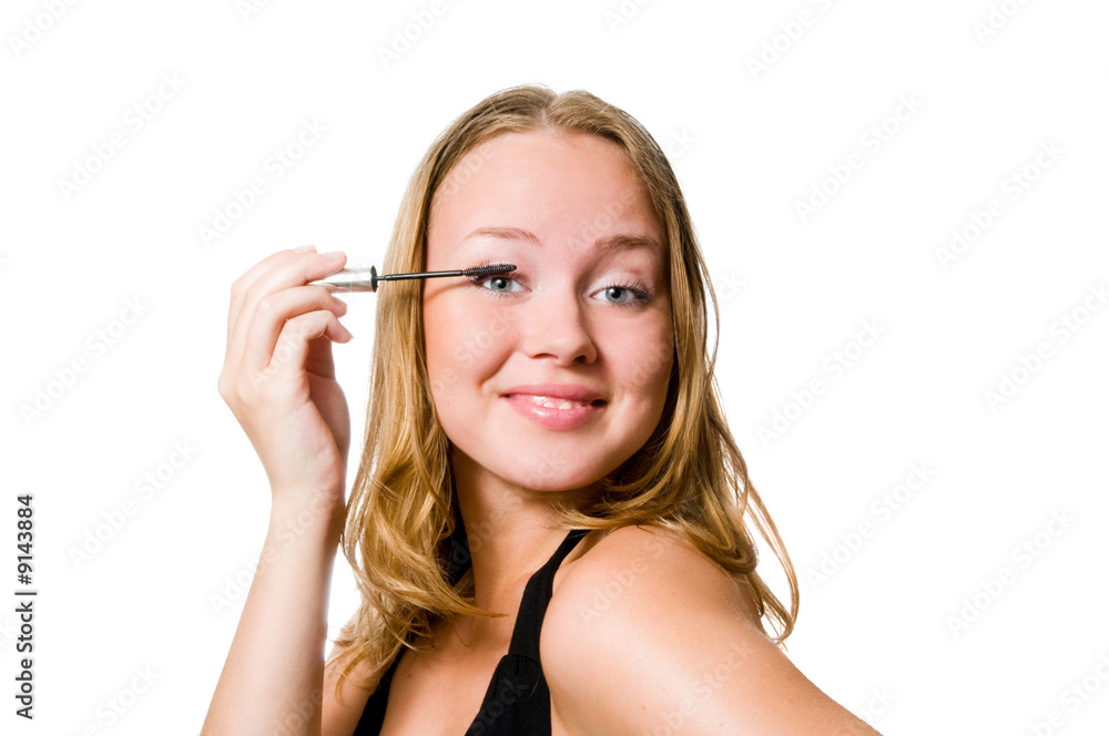 Fototapeta premium Model getting mascara applied.