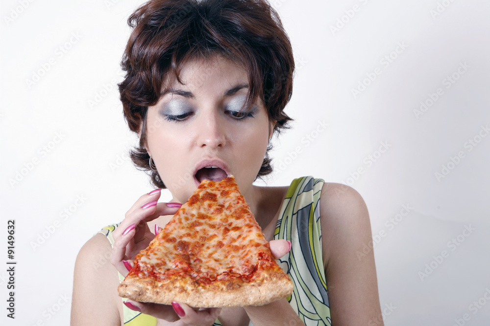 girl eating pizza slice