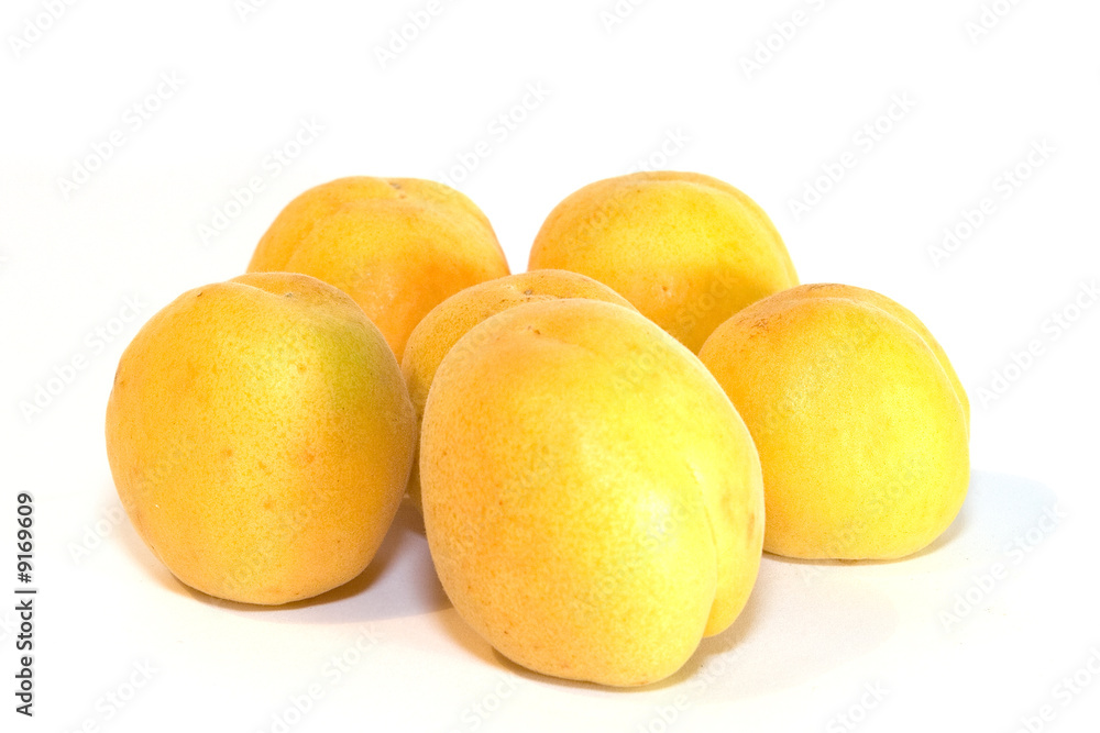 Ripe yellow Apricots on white background Ripe yellow Apricots on white background
