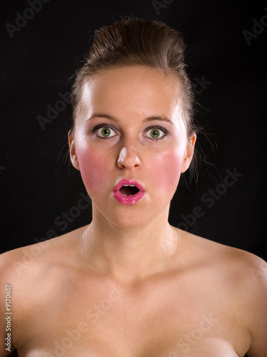 Portrait of surprised and beautiful girl