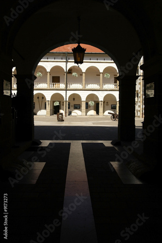 View of light courtyard seen from dark vestibule