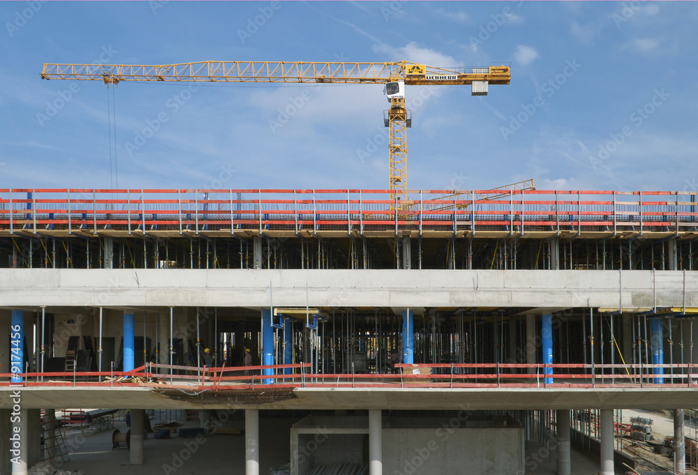 Naklejka premium Construction Site with Crane with Blue Sky