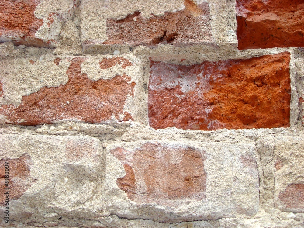 Old brick wall of a fencing of a temple in the street Yakimanka Old brick wall of a fencing of a temple in the street Yakimanka