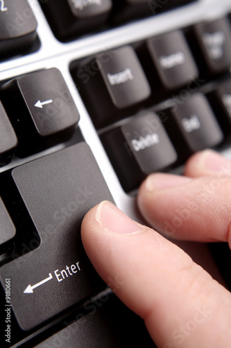 Closeup of fingers on computer keyboard