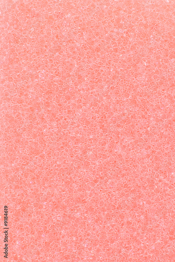 Fototapeta premium Close up of red cleaning sponge surface texture for background