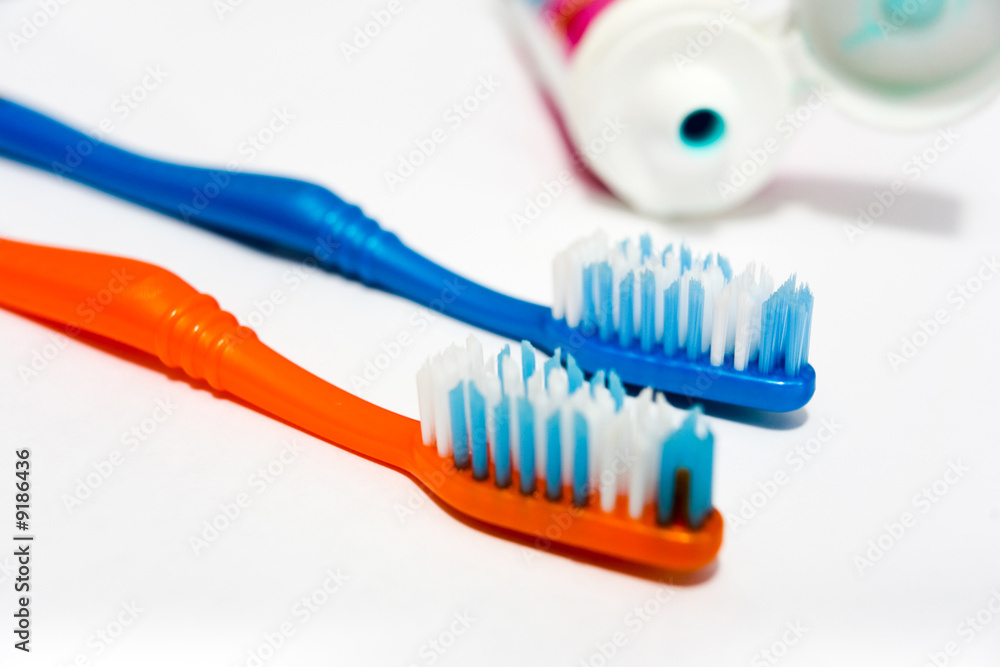 An image of tooth brushes on a white background An image of tooth brushes on a white background