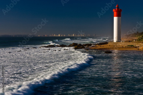 Umhlanga Lighthouse with Durban cityscape as background