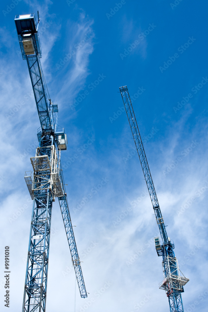 Building tower crane on the sky background Building tower crane on the sky background