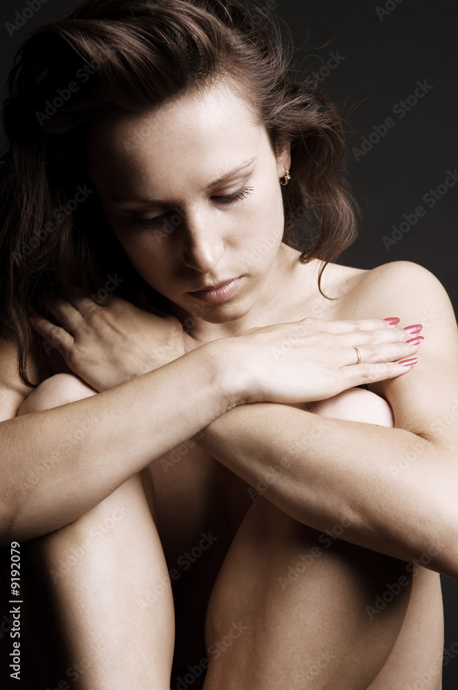 portrait of sad woman over dark background portrait of sad woman over dark background