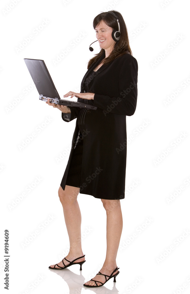 brunette model holding computer on white isolated background brunette model holding computer on white isolated background