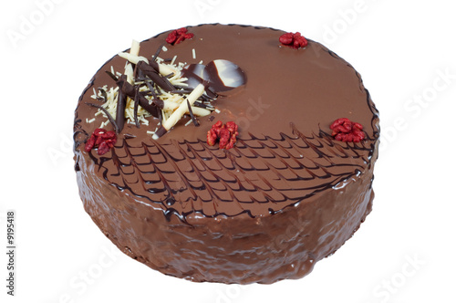 A birthday cake with walnuts and decoration on white photo