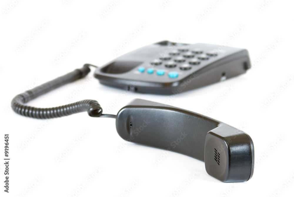 Telephone set on a white background. Out of focus. Telephone set on a white background. Out of focus.