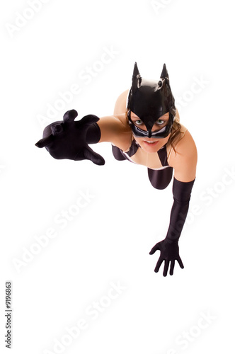 Close-up of young girl in cat mask (isolated on white)