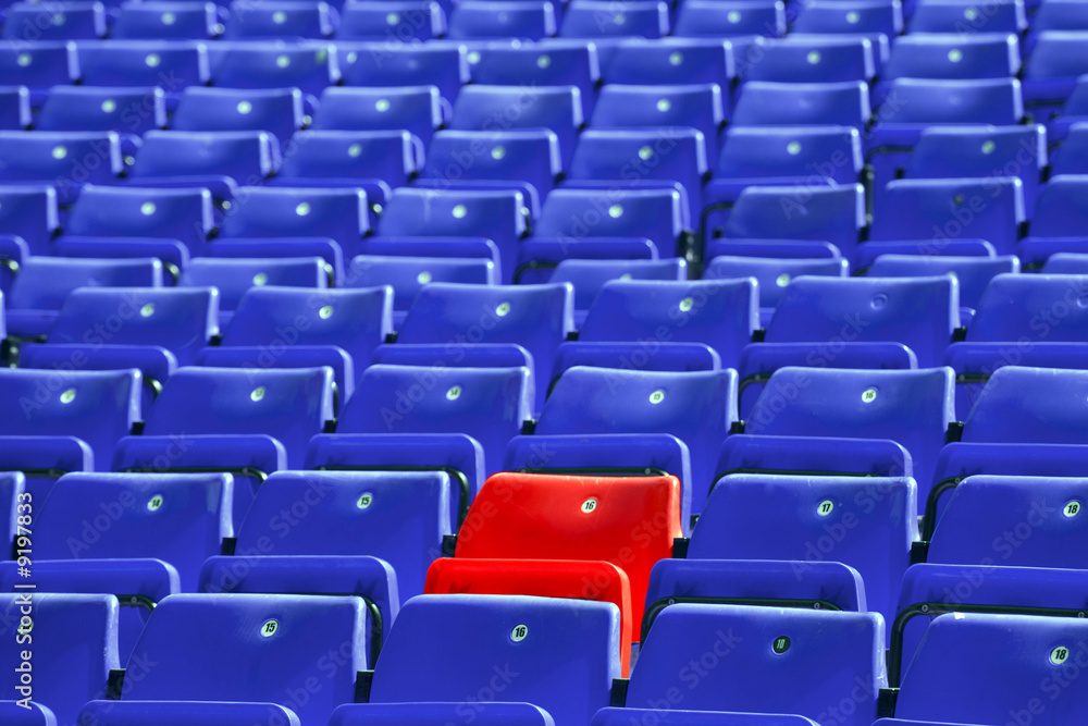 plastic blue sit rows with only one red,shallow deep of field plastic blue sit rows with only one red,shallow deep of field