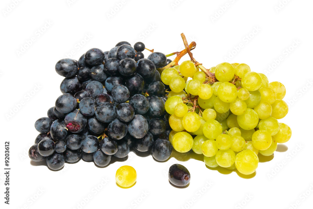 Black and green grapes isolated on white.