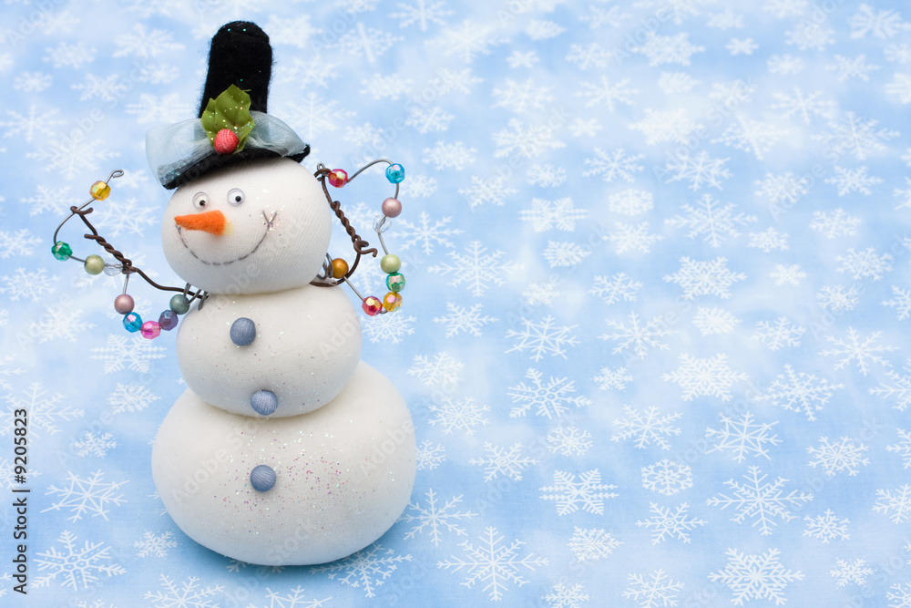 Snowman on blue snowflake background, merry Christmas