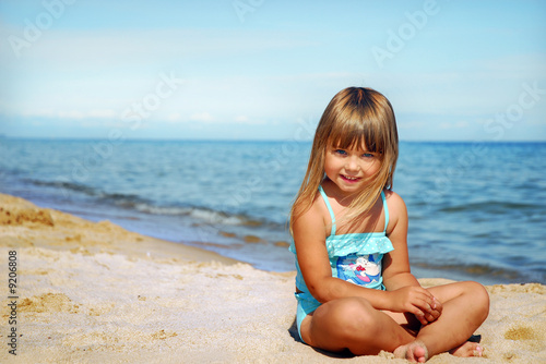 Little cute girl on the beach
