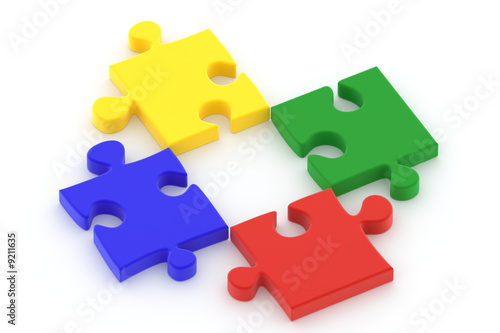 Colorful puzzle pieces isolated ower a white background.
