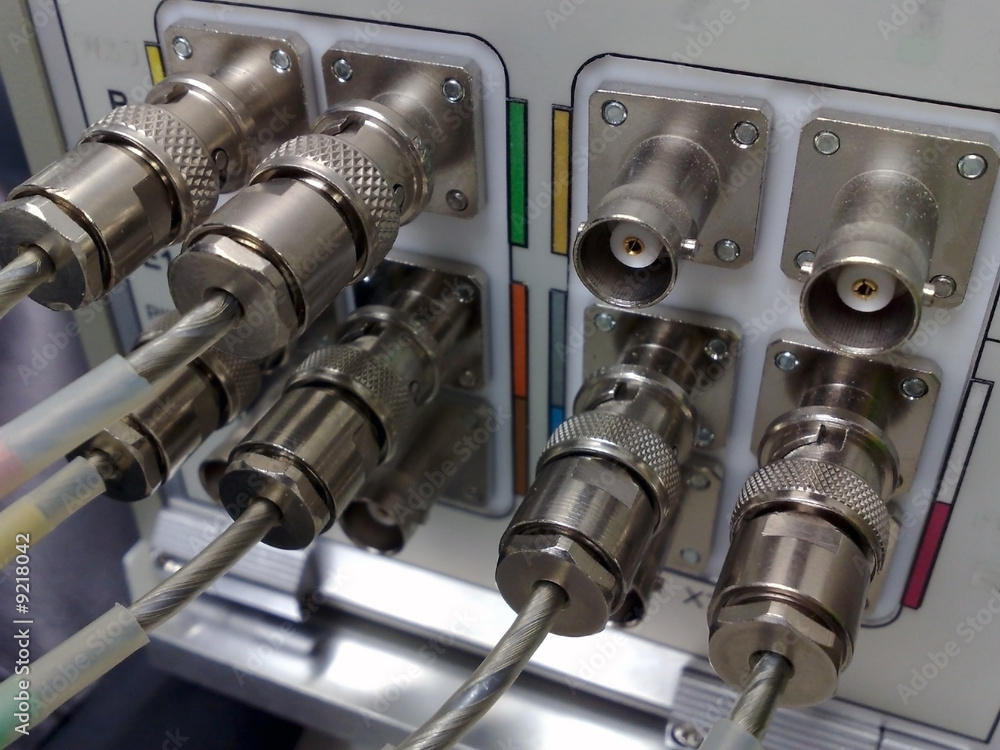 The panel with electric sockets and cables. The panel with electric sockets and cables.