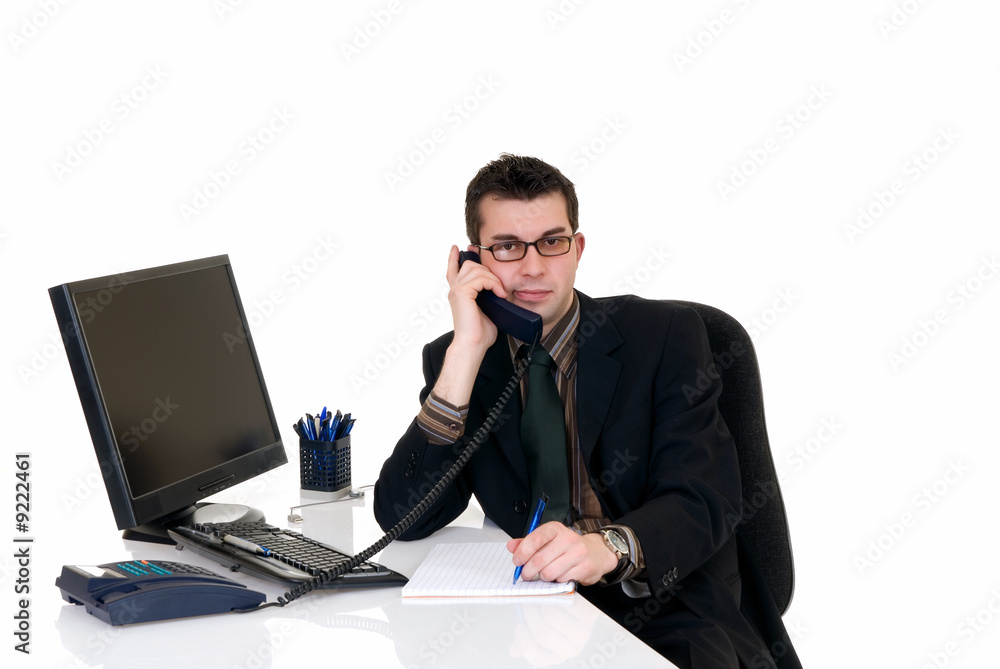 Handsome young successful businessman making phone Handsome young successful businessman making phone