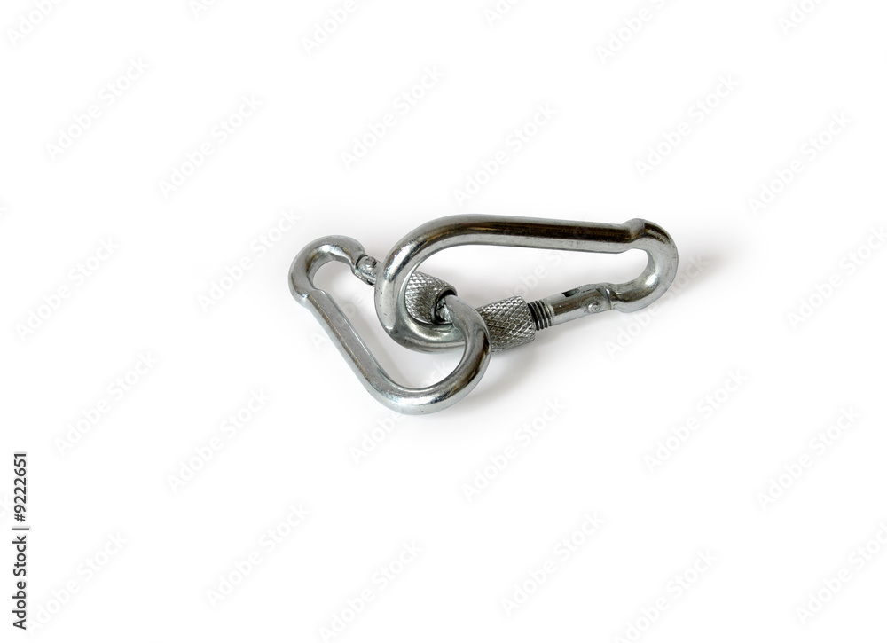 Two fastened clasps lying on white background Two fastened clasps lying on white background