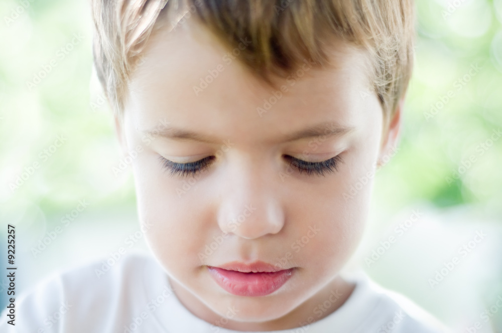 a portrait of a boy thinking, shallow DOF a portrait of a boy thinking, shallow DOF