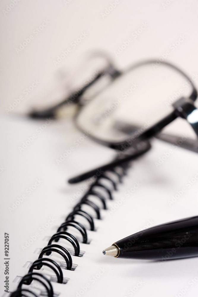Business Team: pen on page with spiral Business Team: pen on page with spiral