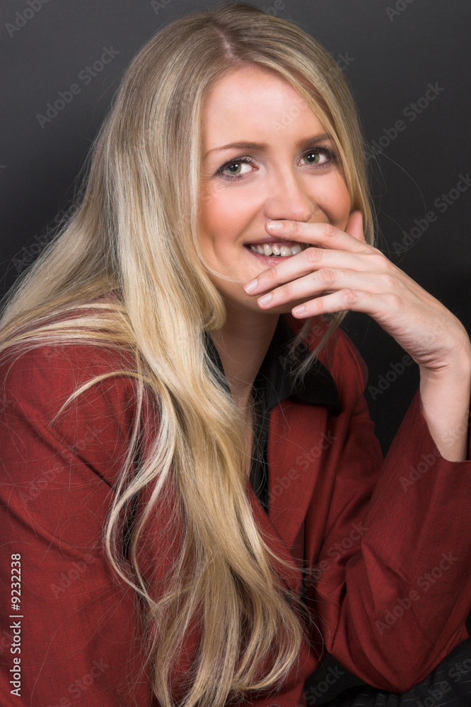 Beautiful young blond model with striking green eyes