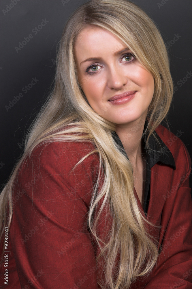 Naklejka premium Beautiful young blond model with striking green eyes
