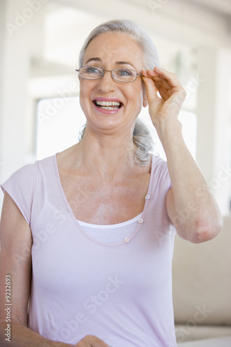 Woman Looking Through New Glasses
