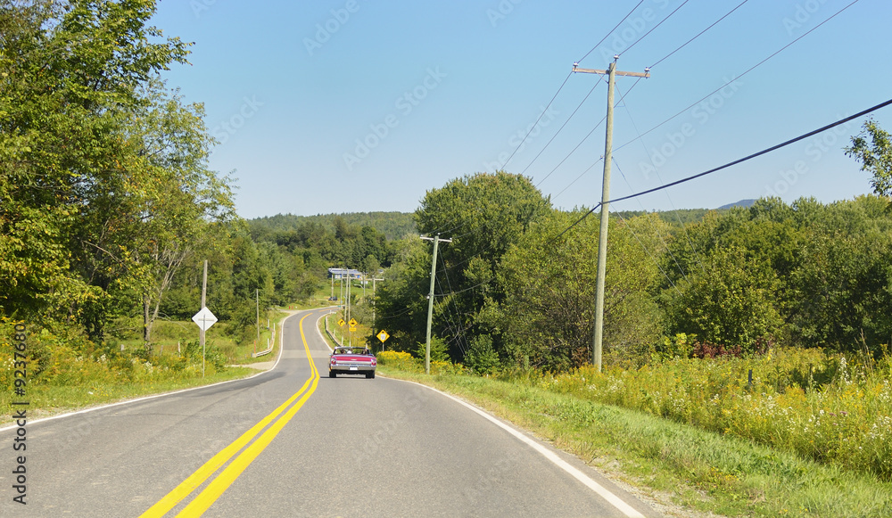 Road in North America with a classic convertble car