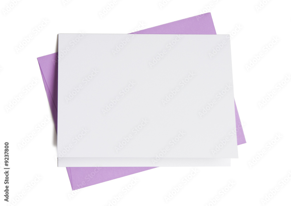 Blank greeting card on top of colored envelope Blank greeting card on top of colored envelope
