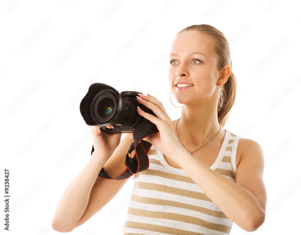 the young pretty woman with photographic camera the young pretty woman with photographic camera