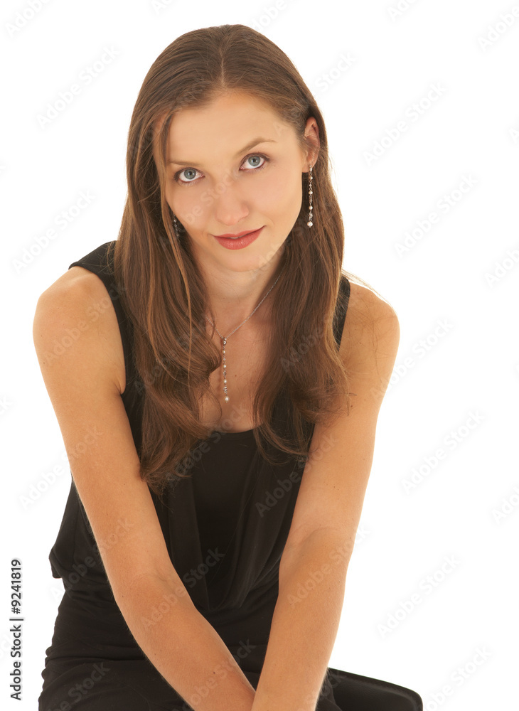 Young adult brunette businesswoman in a black office outfit Young adult brunette businesswoman in a black office outfit