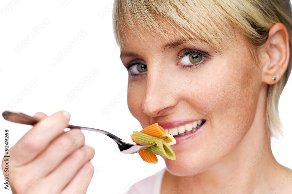 young blond woman eating pasta close up shoot young blond woman eating pasta close up shoot