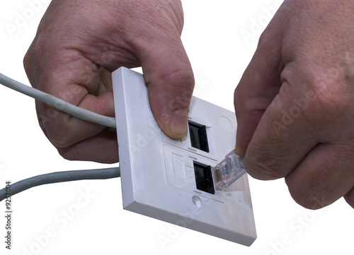 Fotografie CAT5 Plug into Socket