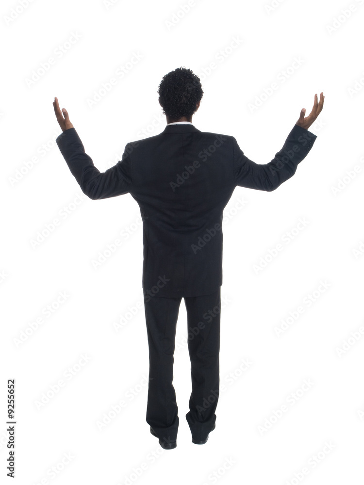 businessman raising his arms in disbelief businessman raising his arms in disbelief