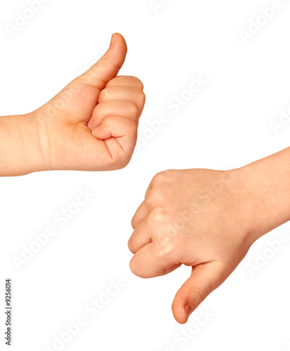 Two hands with thumbs up and down on white background