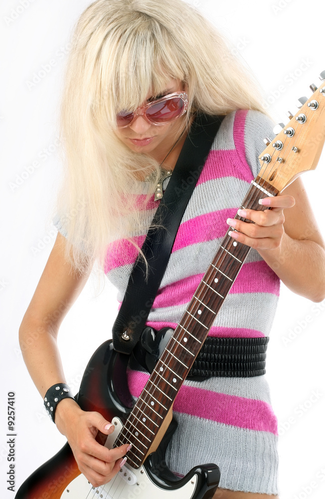 Fototapeta premium beautiful girl with a guitar on a scene