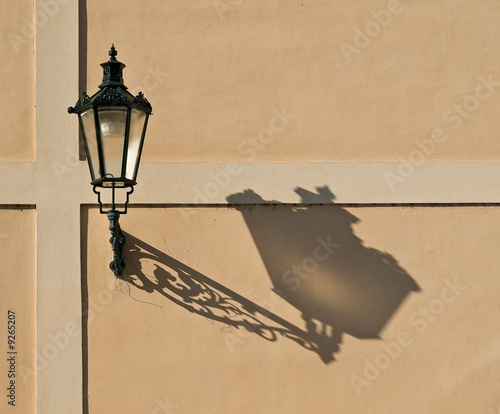 Lamp shadow on the house wall