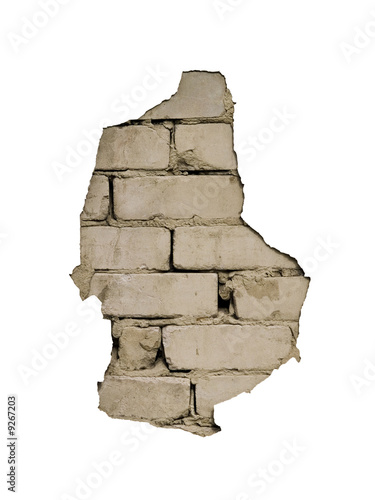 Through a hole in a wall it is visible bricks