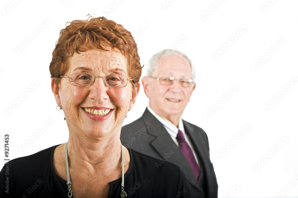 closeup portrait off a senior businesswoman with colleague closeup portrait off a senior businesswoman with colleague