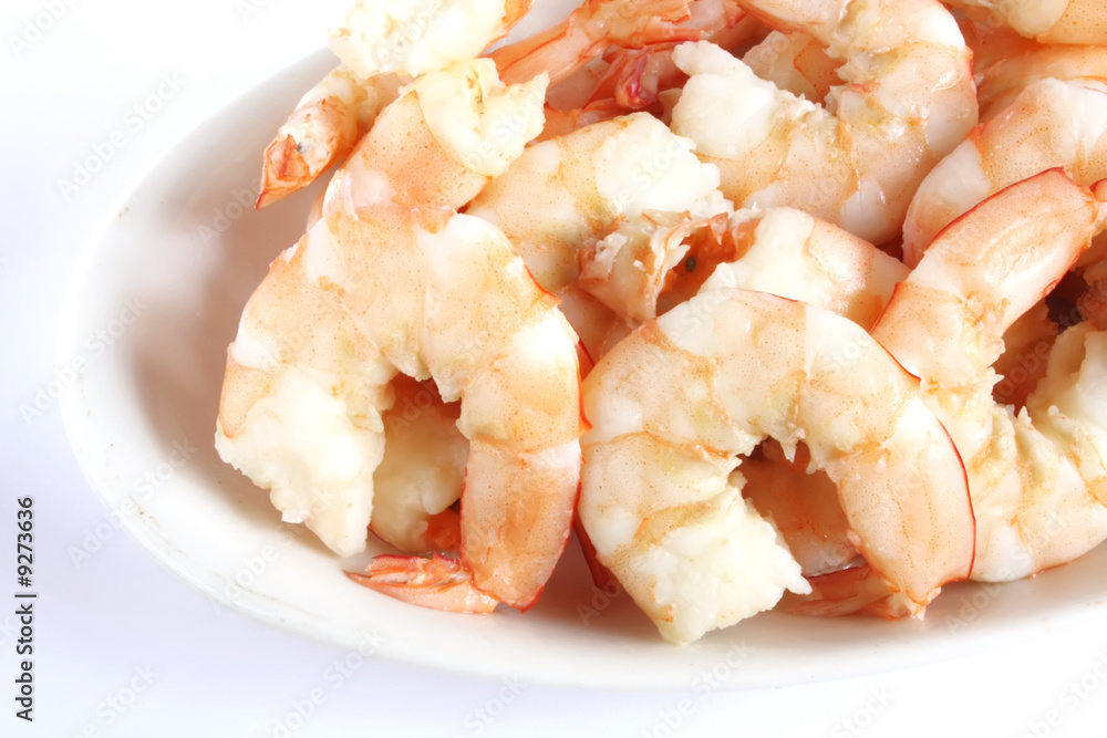 Peeled Prawns on a Plate Isolated on a White Background Peeled Prawns on a Plate Isolated on a White Background
