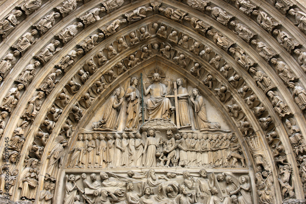 Decoration above the door of Notre Dame cathedral, Paris