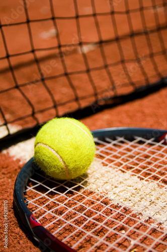 Tennis ball on the court © Valeri Luzina