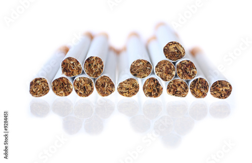 Stack of cigarettes isolated on white