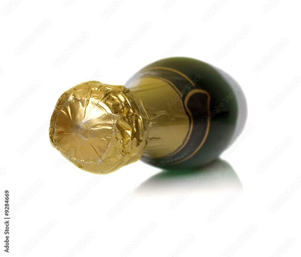 The champagne bottle lays on a white background. Isolation