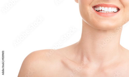 Beautiful young woman smiling. Isolated over white background.