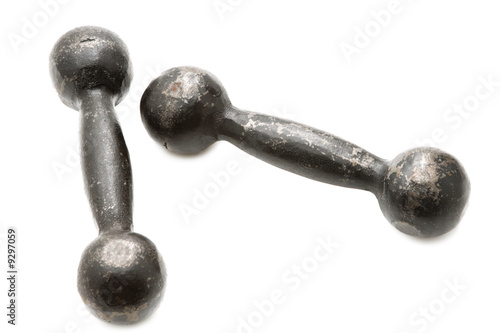 Old dumbbells isolated on a white background