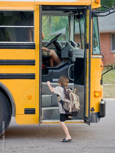 Little Boy Getting on Bus